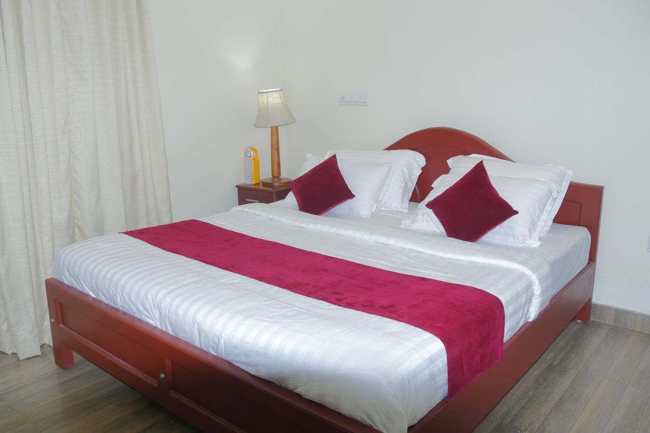 Hotel Mango Meadows à Kottayam Extérieur photo